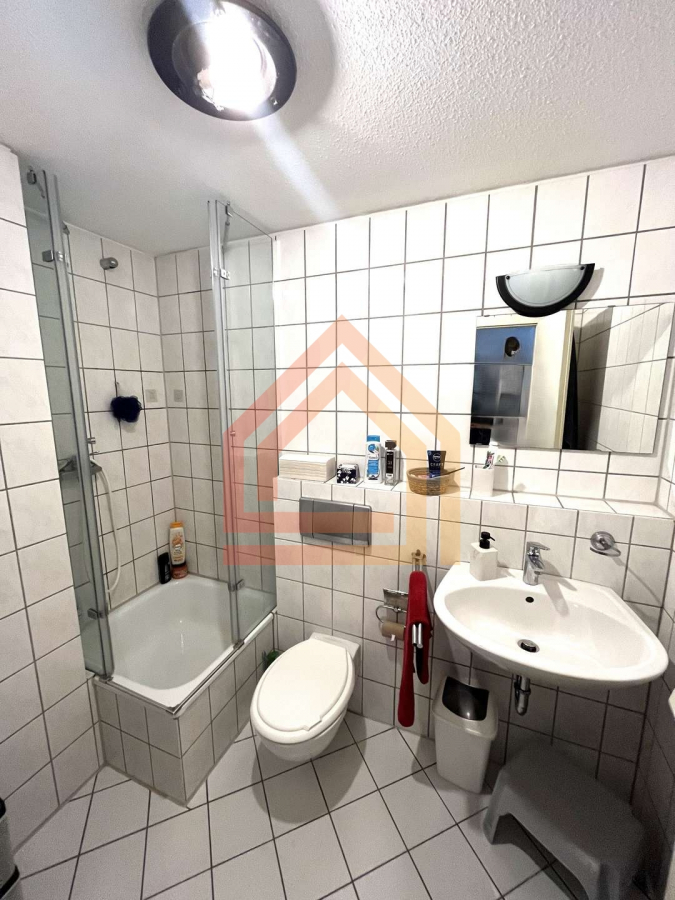 Vermietetes Apartment mit TG-Stellplatz in Stümpen zu verkaufen! - Foto 4